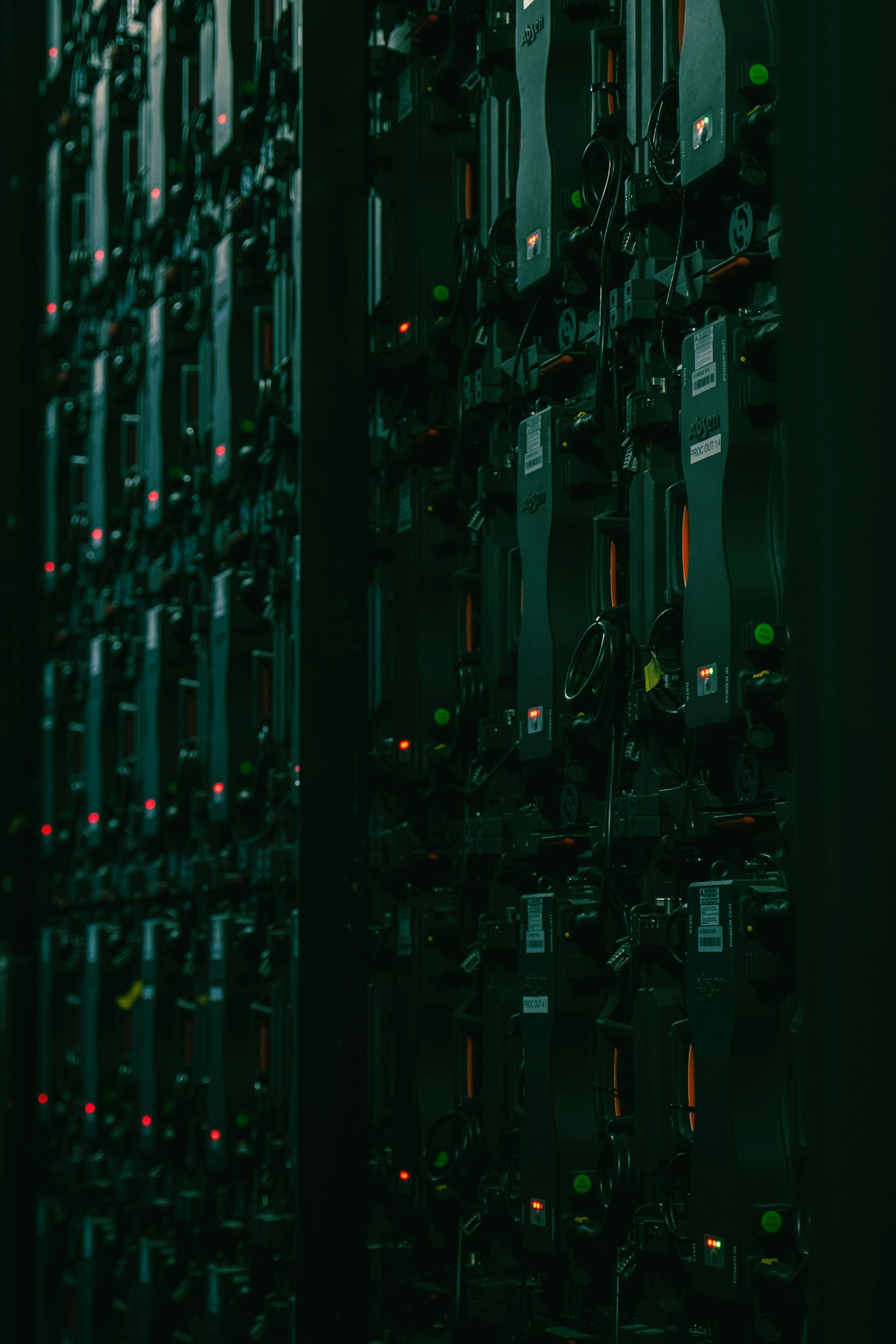 Rows of rack-mounted server hardware with status indicator lights